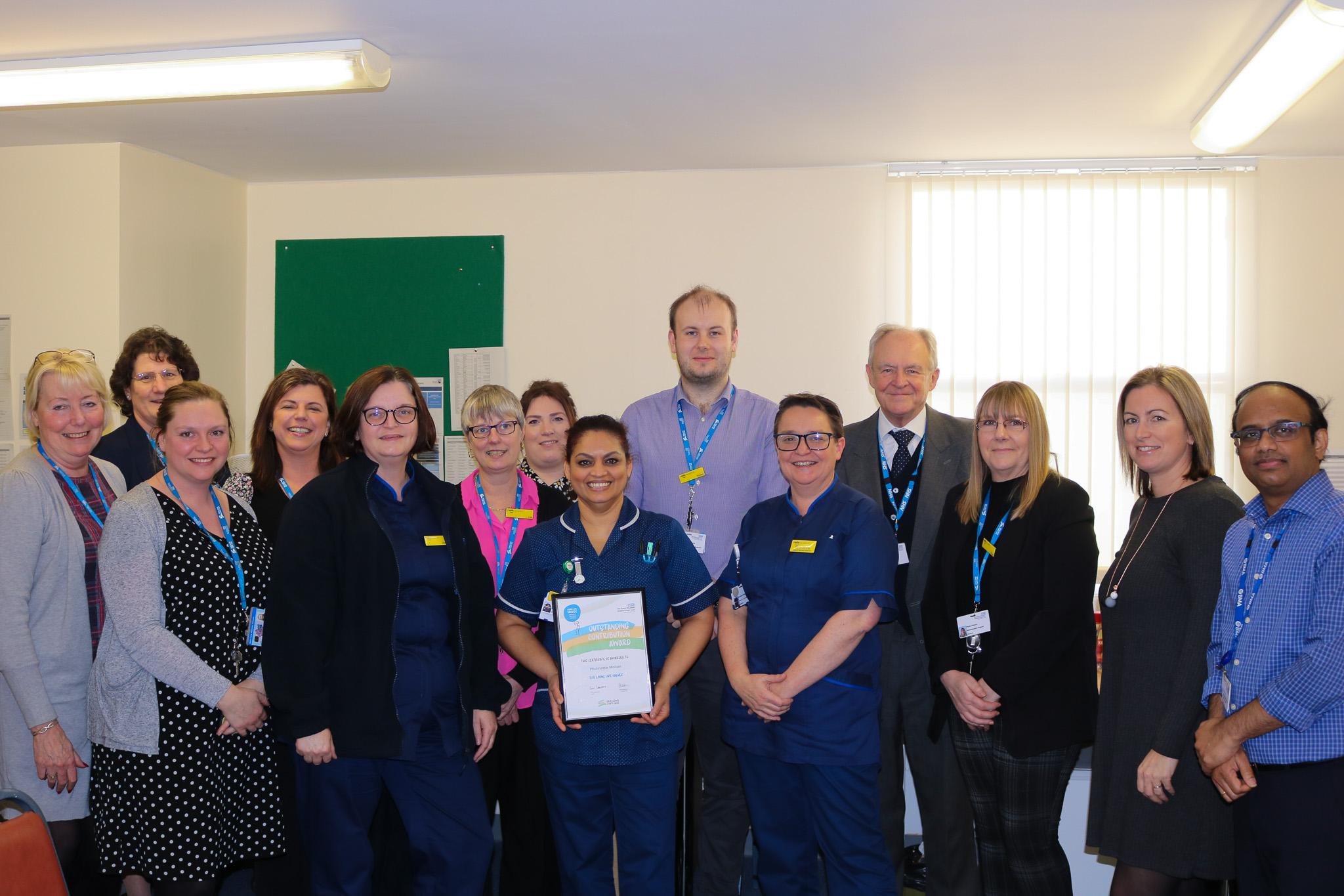 Picture of Phulmattie Mohan, Matron receiving her Living Our Values Award